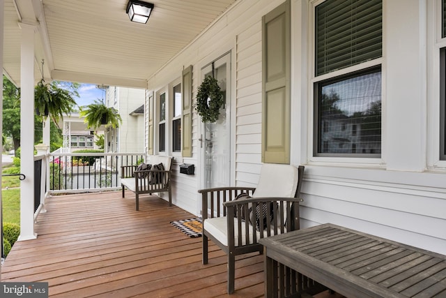 deck with covered porch