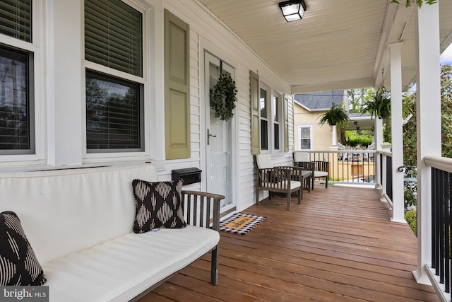 wooden deck with a porch
