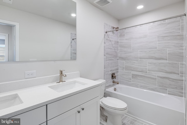 full bathroom with toilet, double vanity, shower / bathtub combination, and recessed lighting