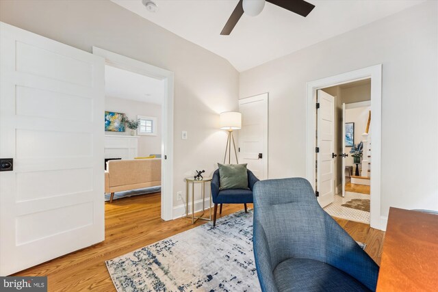 203 Spring Ave, Takoma Park, MD 20912 - sitting room with ceiling fan, light wood finished floors, baseboards, and a fireplace