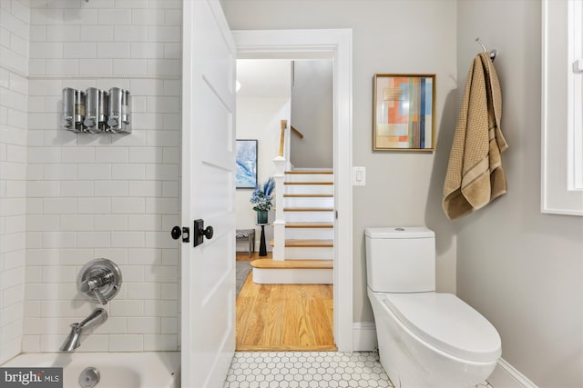 203 Spring Ave, Takoma Park, MD 20912 - full bath with tub / shower combination, toilet, and baseboards