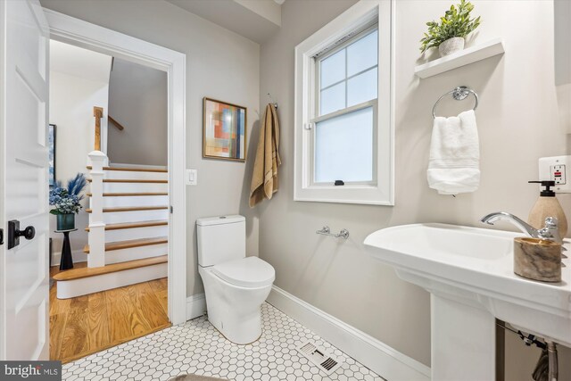 203 Spring Ave, Takoma Park, MD 20912 - bathroom featuring toilet and baseboards