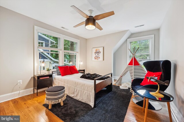 203 Spring Ave, Takoma Park, MD 20912 - bedroom featuring light wood-type flooring, baseboards, and a ceiling fan