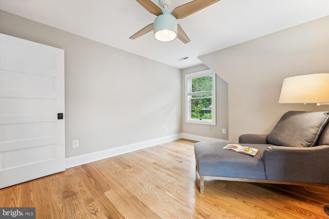 203 Spring Ave, Takoma Park, MD 20912 - living area with baseboards, light wood finished floors, and a ceiling fan