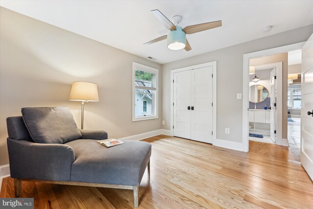 203 Spring Ave, Takoma Park, MD 20912 - sitting room featuring light wood-type flooring, a ceiling fan, and baseboards