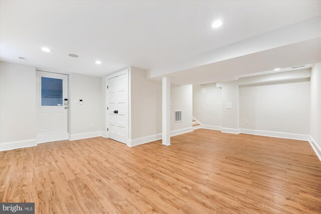 203 Spring Ave, Takoma Park, MD 20912 - finished below grade area with light wood-style floors, baseboards, stairway, and recessed lighting