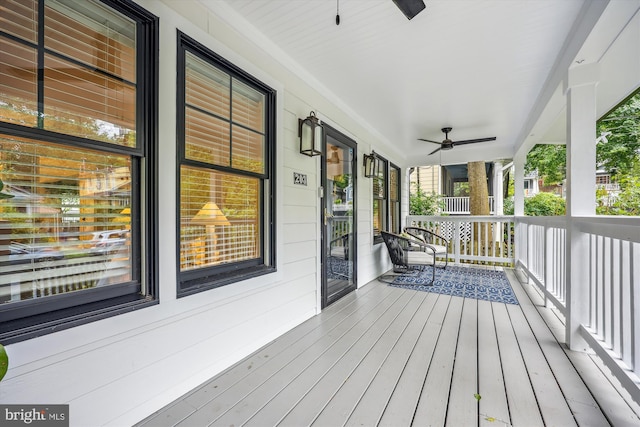 203 Spring Ave, Takoma Park, MD 20912 - wooden porch with a ceiling fan