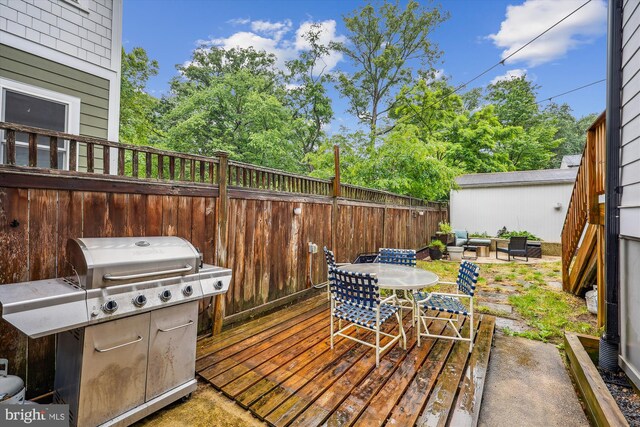 203 Spring Ave, Takoma Park, MD 20912 - wooden terrace with outdoor dining space, an outdoor hangout area, and a grill