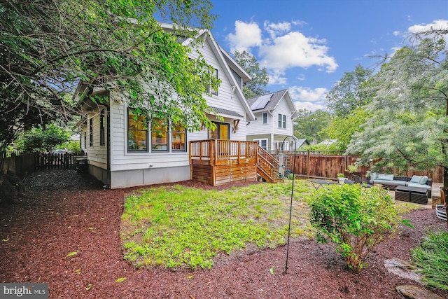 203 Spring Ave, Takoma Park, MD 20912 - rear view of property with a fenced backyard and an outdoor hangout area