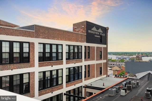 view of building exterior with central air condition unit
