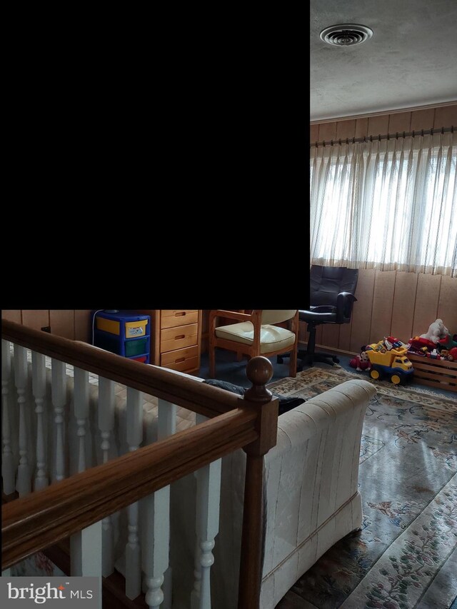 1215 Georgetown Cir, Carlisle, PA 17013 - living room featuring a textured ceiling