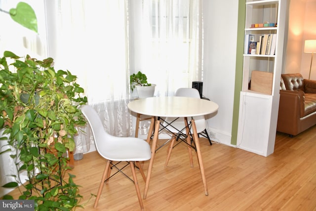 dining room with light wood finished floors