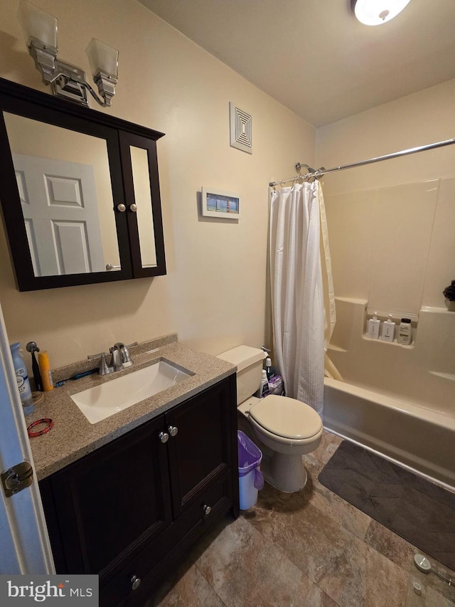 bathroom with toilet, vanity, and shower / bathtub combination with curtain