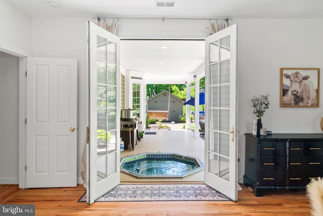 5194 Chase Ln, Midland, VA 22728 - entryway featuring french doors and wood finished floors