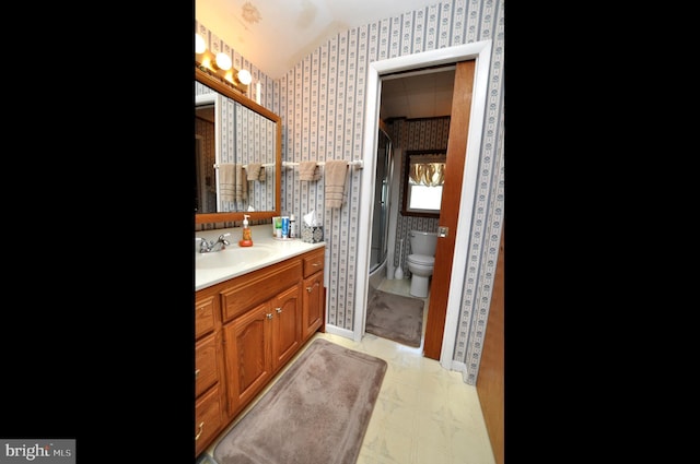 400 S Arthur Dr, Edgewater Park, NJ 08010 - full bathroom with wallpapered walls, vanity, toilet, and vaulted ceiling