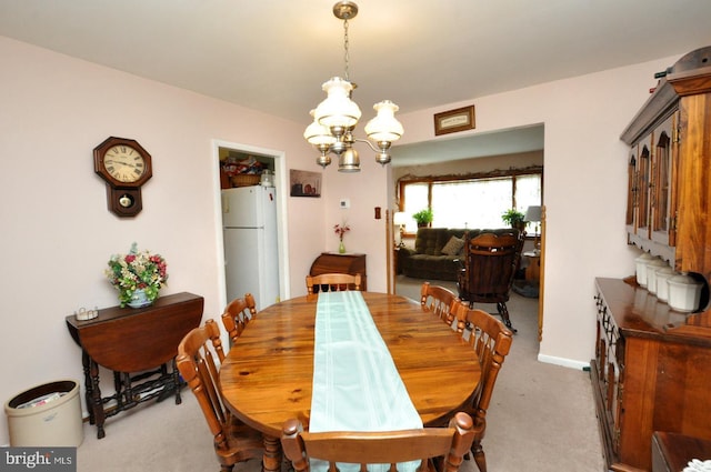400 S Arthur Dr, Edgewater Park, NJ 08010 - carpeted dining room with a chandelier