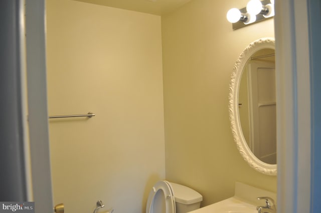 bathroom featuring toilet