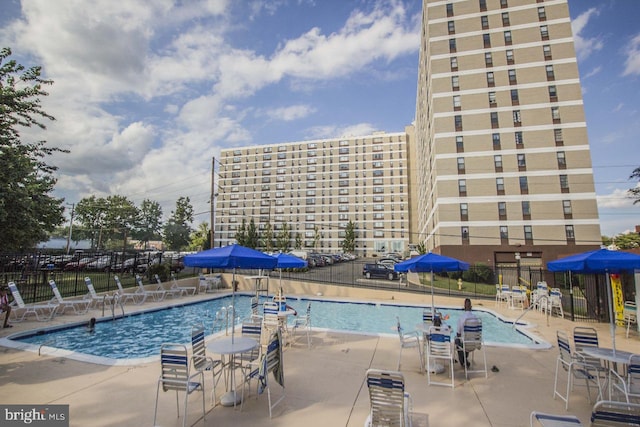 4600 Duke St Unit 512, Alexandria, VA 22304 - community pool featuring a patio area