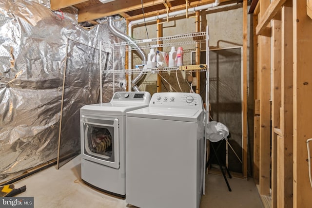washroom featuring washer and dryer