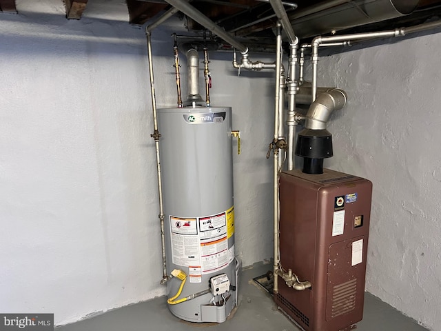 utility room with gas water heater