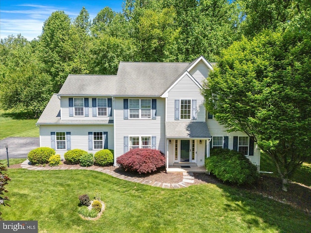 21 Bright Summer Way, Glenmoore, PA 19343 - view of front of home with a front lawn and a shingled roof