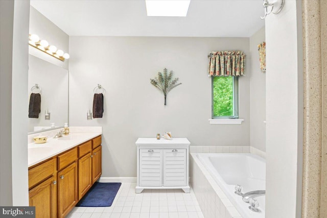 21 Bright Summer Way, Glenmoore, PA 19343 - full bathroom with double vanity, a bath, tile patterned floors, a skylight, and baseboards