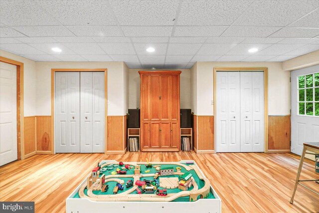 21 Bright Summer Way, Glenmoore, PA 19343 - game room featuring wainscoting, light wood finished floors, and a drop ceiling