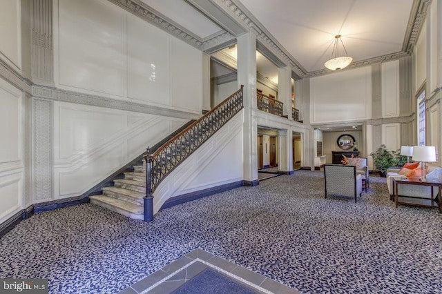 2129 Florida Ave NW Unit 507, Washington, DC 20008 - common area with a high ceiling, stairway, and a decorative wall