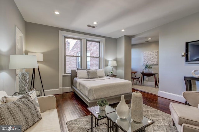 2129 Florida Ave NW Unit 507, Washington, DC 20008 - bedroom featuring baseboards, wood finished floors, and recessed lighting