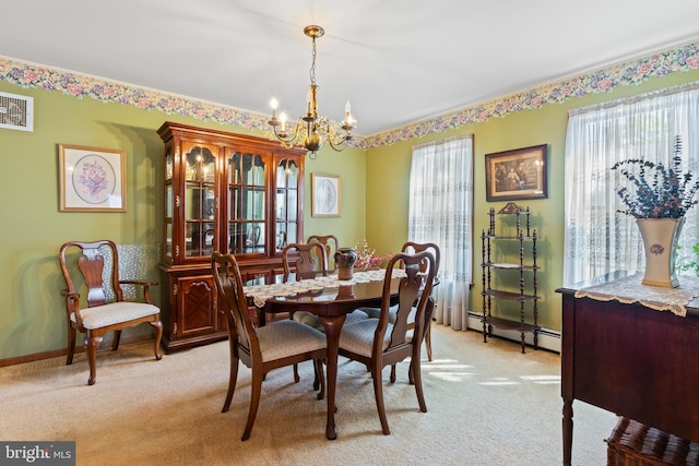 dining space with a chandelier, a baseboard radiator, light colored carpet, and baseboards