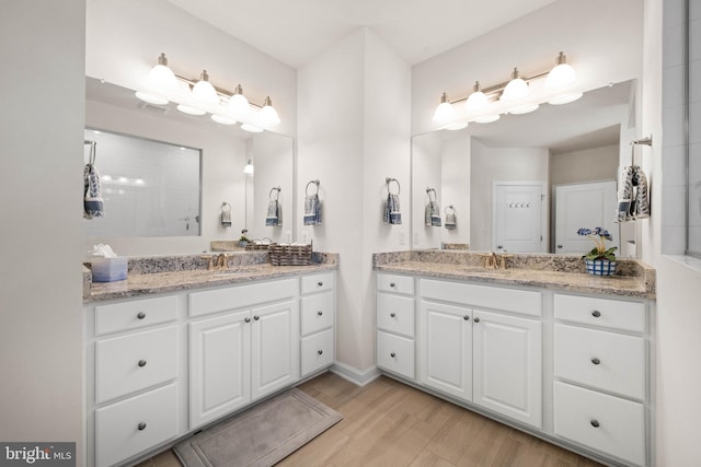 355 Dillon Cir, Middletown, DE 19709 - bathroom with two vanities and wood finished floors