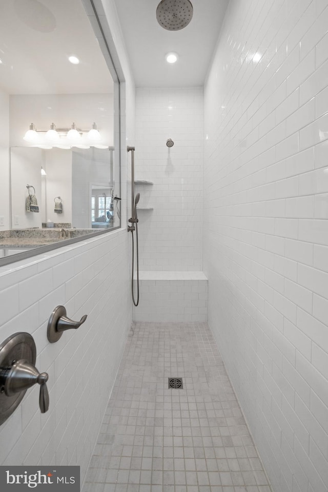 355 Dillon Cir, Middletown, DE 19709 - bathroom featuring a tile shower, tile patterned flooring, and recessed lighting