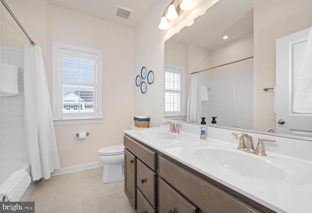 355 Dillon Cir, Middletown, DE 19709 - bathroom featuring double vanity, tile patterned flooring, toilet, shower / bath combination with curtain, and baseboards