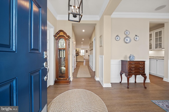 355 Dillon Cir, Middletown, DE 19709 - foyer with wood finished floors, a chandelier, and ornamental molding