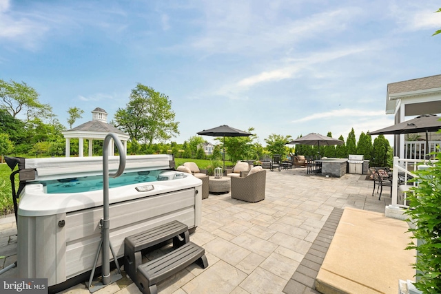 355 Dillon Cir, Middletown, DE 19709 - view of patio / terrace featuring outdoor dining space, a hot tub, and a gazebo