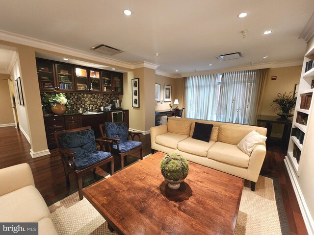 66 Franklin St Unit 307, Annapolis, MD 21401 - living area with recessed lighting, dark wood finished floors, crown molding, and baseboards
