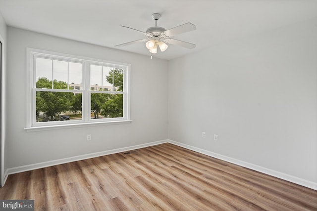 3823 9th Rd S, Arlington, VA 22204 - unfurnished room with wood finished floors, a ceiling fan, and baseboards