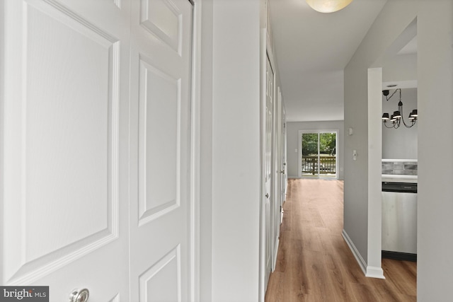 3823 9th Rd S, Arlington, VA 22204 - hall with light wood finished floors and a chandelier