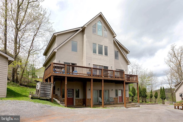 175 Roman Ridge Rd Unit 15, Oakland, MD 21550 - back of property featuring a deck and stone siding