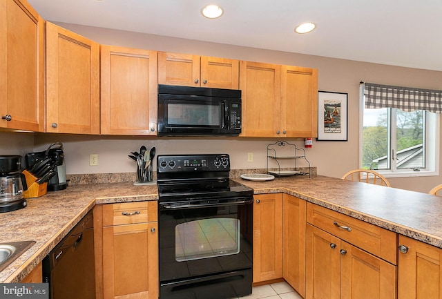 175 Roman Ridge Rd Unit 15, Oakland, MD 21550 - kitchen featuring black appliances, light tile patterned floors, recessed lighting, light countertops, and a peninsula