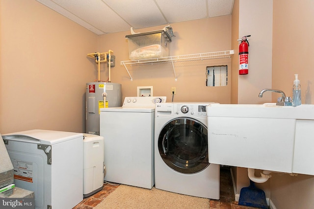 175 Roman Ridge Rd Unit 15, Oakland, MD 21550 - clothes washing area with water heater and washing machine and clothes dryer