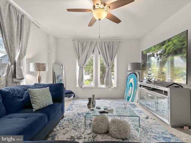 4511 Powell Ave, Baltimore, MD 21206 - carpeted living room with a ceiling fan