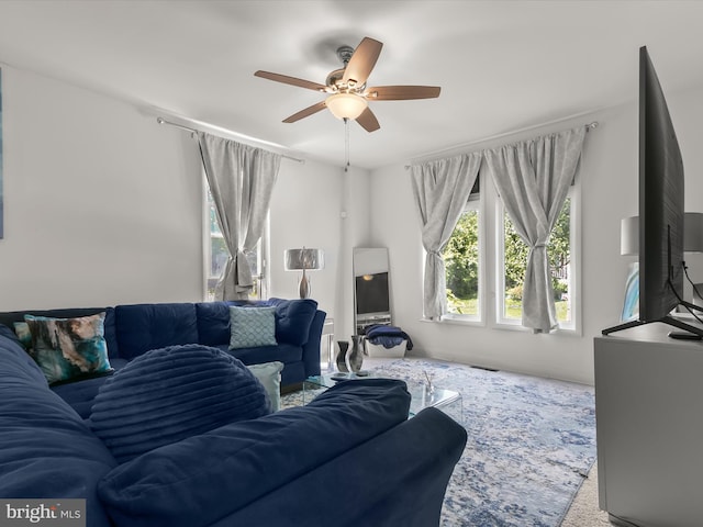 4511 Powell Ave, Baltimore, MD 21206 - carpeted living room with ceiling fan