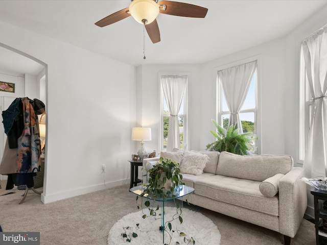4511 Powell Ave, Baltimore, MD 21206 - living room with carpet, ceiling fan, and baseboards