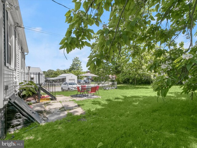 4511 Powell Ave, Baltimore, MD 21206 - view of yard featuring a patio