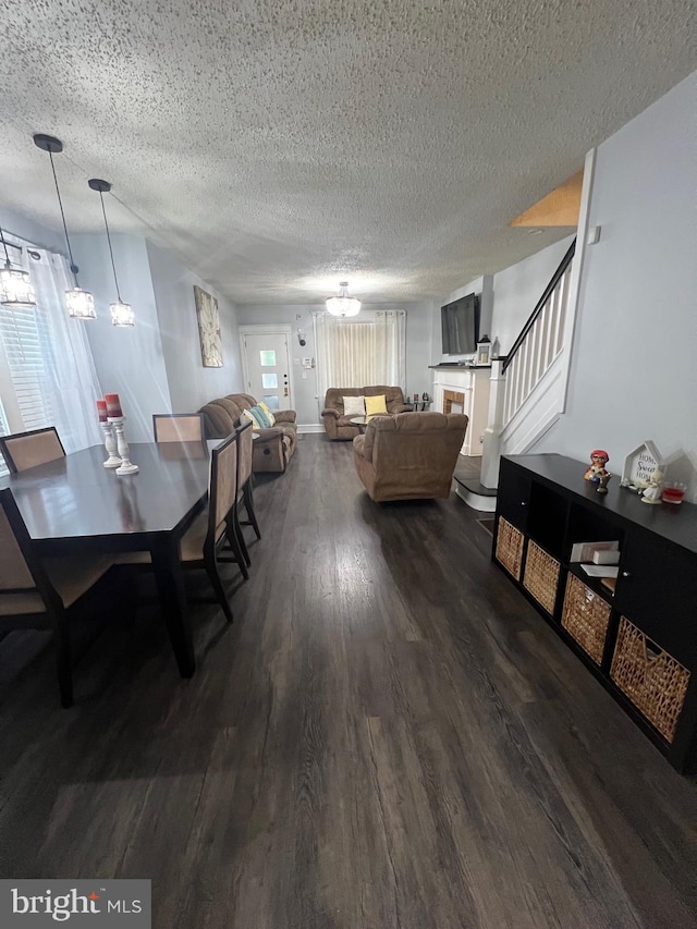 453 Bert Ave, Trenton, NJ 08629 - dining area featuring a chandelier, a textured ceiling, and dark wood-type flooring