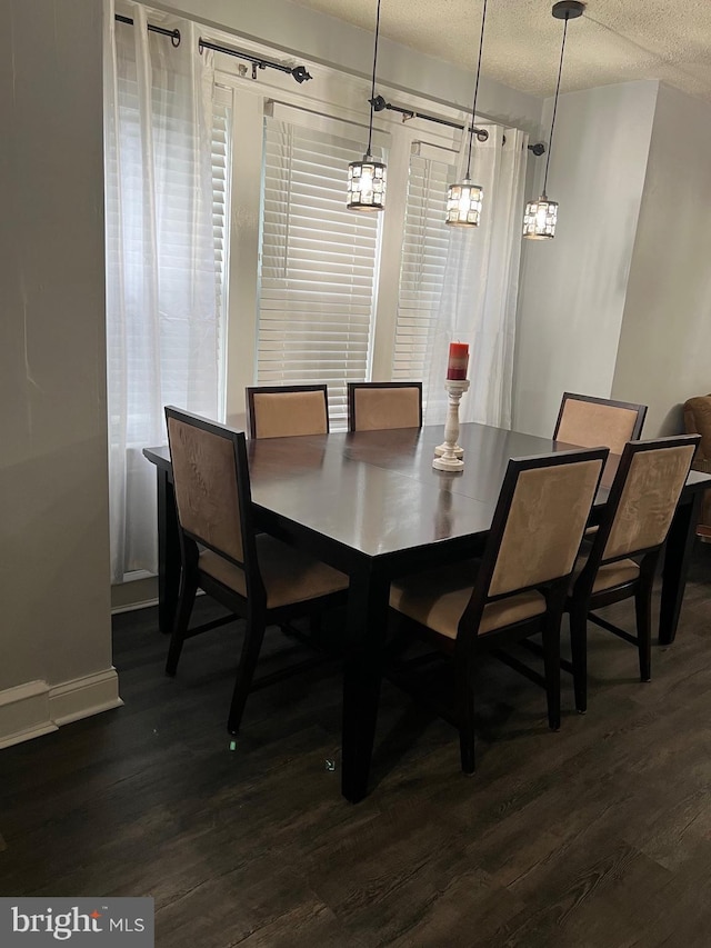 453 Bert Ave, Trenton, NJ 08629 - dining room featuring dark wood finished floors, a textured ceiling, and baseboards