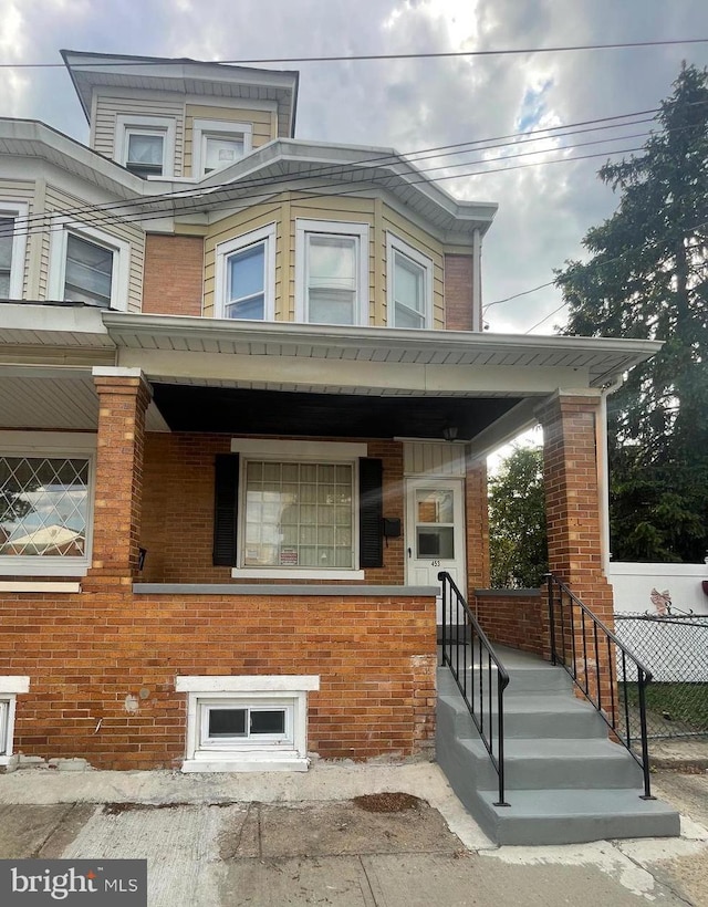453 Bert Ave, Trenton, NJ 08629 - view of exterior entry featuring a porch and brick siding