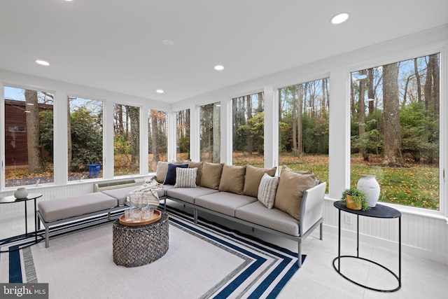 sunroom / solarium with outdoor lounge area and healthy amount of natural light