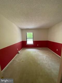 586 Wild Flower Glade, Annapolis, MD 21409 - carpeted empty room with wainscoting and a textured ceiling